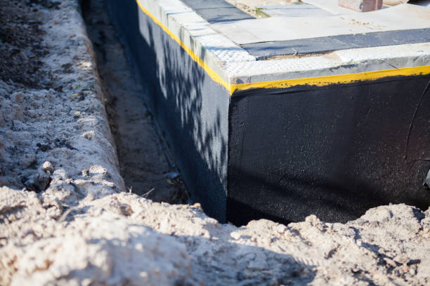 Professional Waterproofing technician working in Burlington, WI